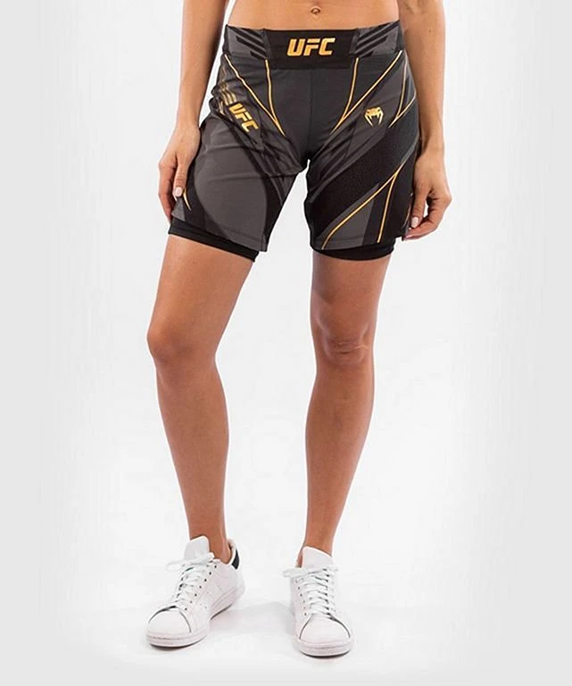 Venum UFC Authentic Fight Night Womens Shorts Long Fit Nero-Oro 3 Venum UFC Authentic Fight Night Womens Shorts Long Fit Nero-Oro